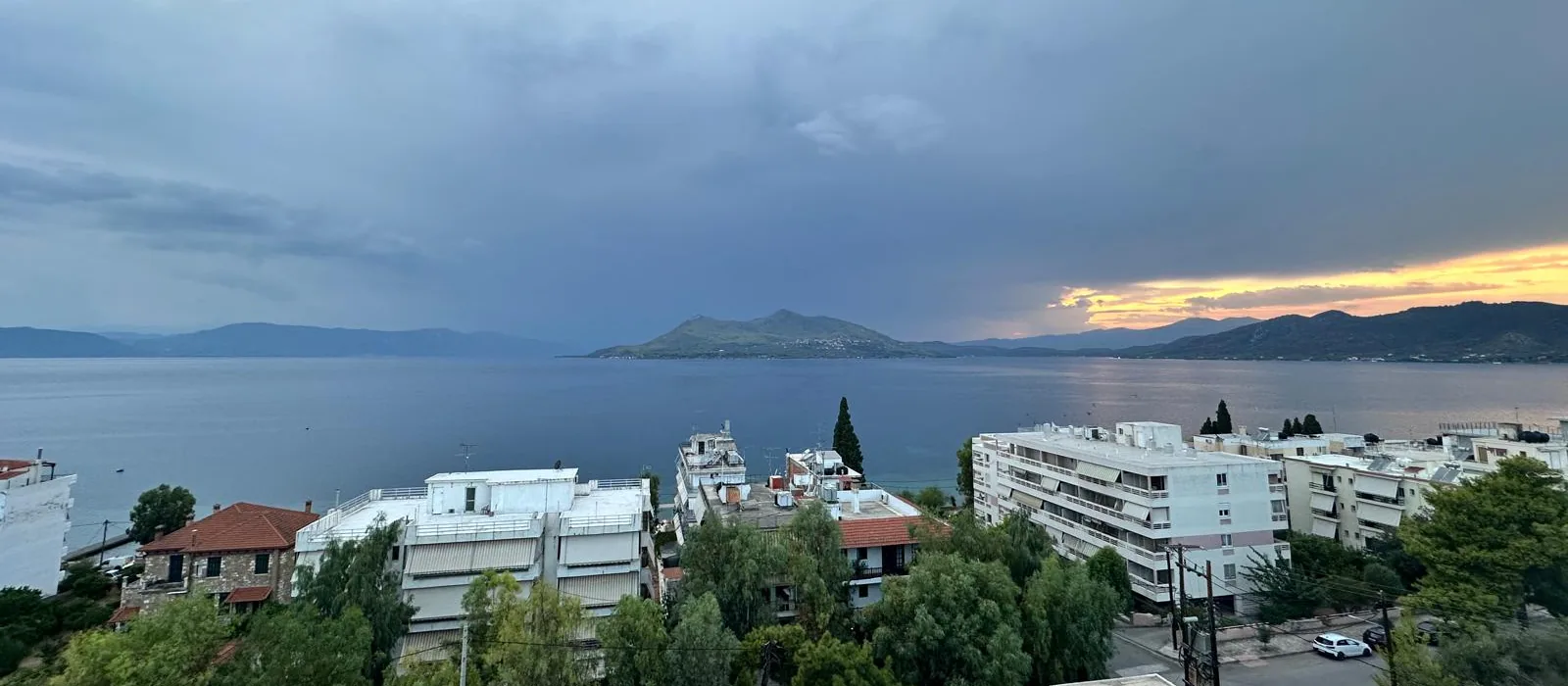 View of Edipsos bay at dusk from the top floor of Alexiou Studios